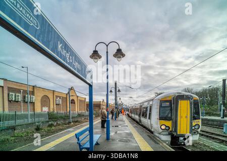 A Great Northern train from London King's Cross arriving at King's Lynn on an overcast rainy day in December. Stock Photo