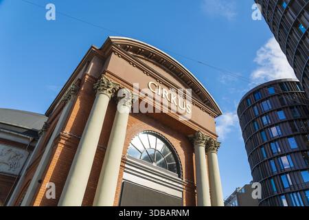 Copenhagen, Denmark - 30 September 2025: View of the striking Cirukus building with its elegant architecture juxtaposed against the modern curves of a Stock Photo
