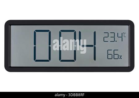 Large wall clock with white digits, alarm function and temperature measurement. On a white background in isolation. Stock Photo