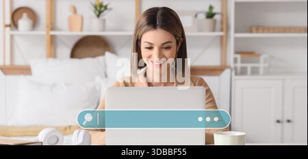 Young woman using laptop at home. Concept of search Stock Photo