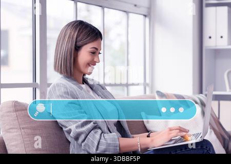 Young businesswoman using laptop in office. Concept of search Stock Photo