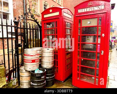 Traditional red telephone boxes on a street in Nottingham, England, U.K. Stock Photo