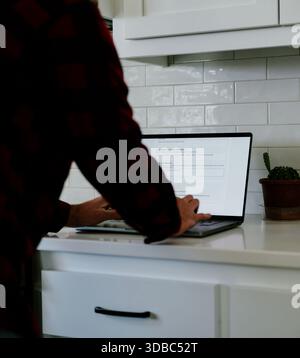 Middle Aged Man Applies for Student Loan Financial Aid and Scholarships - Never Too Late to Return to School - Adult Higher Education Growth Concept Stock Photo