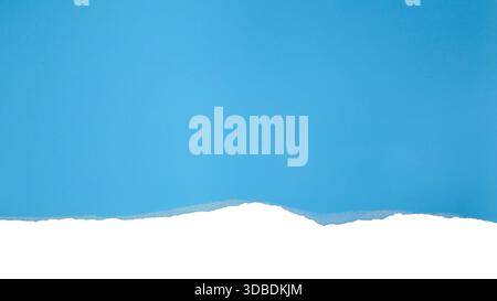 Torn light blue paper with black background. Concept for presentation and education Stock Photo
