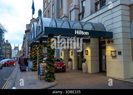 Hilton hotel entrance in Cambridge, UK, decorated with festive Christmas lights Stock Photo