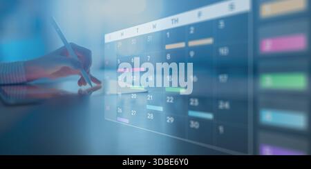 Project Management and Schedule Planning Displayed on a Digital Calendar Interface. Stock Photo