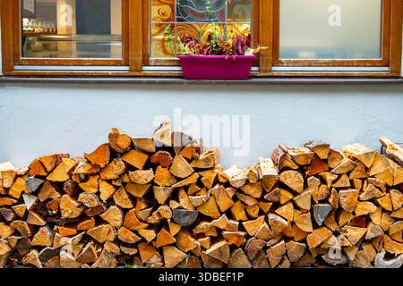 Stacked Firewood in Rural Austria Stock Photo