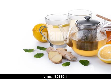 Ginger tea with honey and lemon in a cup isolated on white background Stock Photo