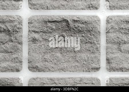 Dusty dirty air filter with plastic frames. Abstract gray background Stock Photo