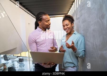 Artificial intelligence, programming innovation. Teamwork with laptops for future solutions Stock Photo