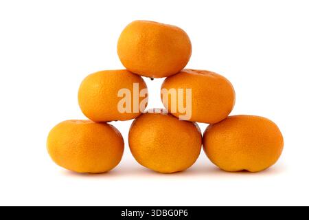 Whole and sliced tangerines with green leaf on black background mandarin orange Stock Photo