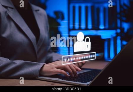 Cybersecurity login protection concept. Businesswoman typing on laptop with password and padlock icon representing secure user authentication, Stock Photo
