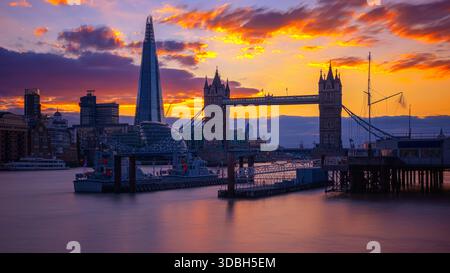 Long exposure, London cityscape with Tower Bridge and the Shard at sunset Stock Photo