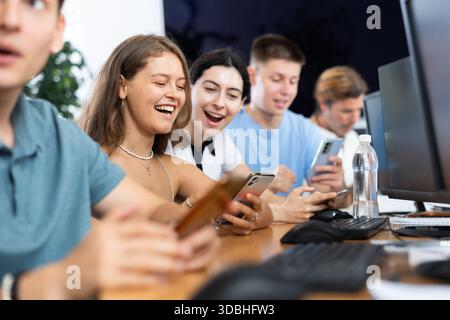 Student are engrossed in their mobile Stock Photo
