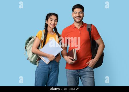 Young Students Smiling Together While Preparing for a New Semester in a Bright Location Stock Photo