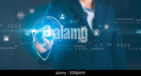 Businessman interacting with digital security interface showing lock icon, secure access, data protection cybersecurity technology, representing digit Stock Photo