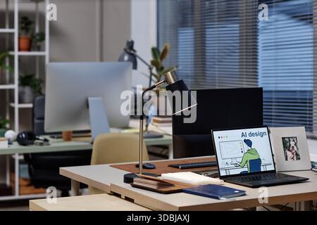 Modern Office Desk Featuring Laptop Displaying AI Design Illustration Stock Photo