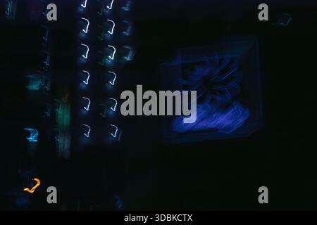 An abstract digital glitch or light leak effect with blue and green tones, creating a modern tech background. Stock Photo