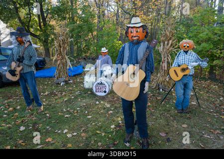 Pumpkin headed people dressed up as a band in fall, Jackson, New Hampshire Stock Photo