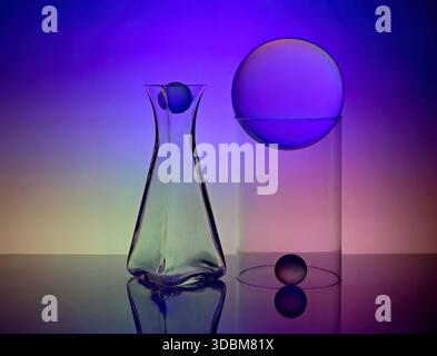 Glass items with colorful background lighting Stock Photo