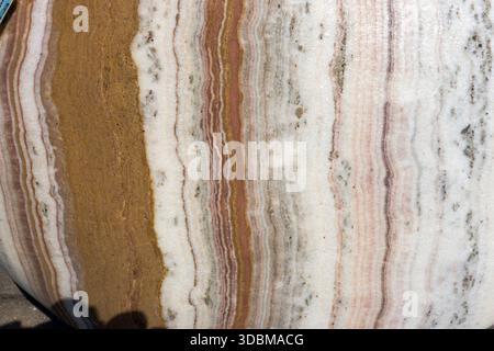 Different colored layers of a natural stone Stock Photo