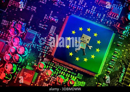 Computer chip with EU flag and robot labeled AI, symbolic photo AI guidelines, AI Act, photomontage Stock Photo