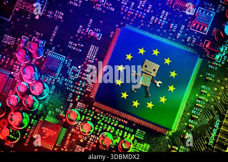 Computer chip with EU flag and robot labeled AI, symbolic photo AI guidelines, AI Act, photomontage Stock Photo