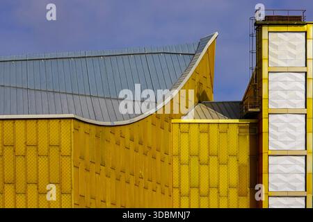 Berlin, Germany, Philharmonie Berlin, golden facade, aluminum panels, Hans Scharoun, Kulturforum, Tiergarten, Herbert-von-Karajan-Strasse, geometric design, curved roof, chimney detail, cultural landmark Stock Photo
