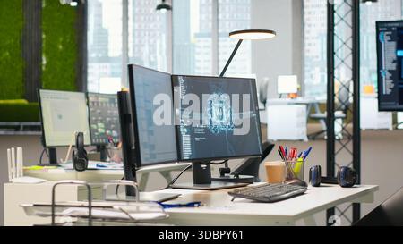 PC in empty tech startup office displaying AI neural networks programming languages used for building applications. Computer monitor showing deep learning code in software development agency Stock Photo