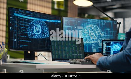 Black businessman using AI digital tools and machine learning models, performing data analysis for innovation creating adaptive optimized business solutions. Cloud computing. Camera B. Stock Photo