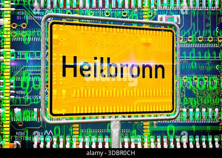Heilbronn town sign in front of computer board and binary code, large-scale AI project IPAI, photomontage Stock Photo
