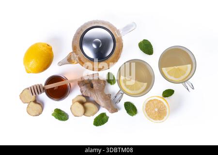 Ginger tea with honey and lemon in a cup isolated on white background Stock Photo