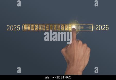 Loading bar in progress. Golden metallic interface with hand of African American man pointing toward 2026 goal, symbol of new year transition, update, Stock Photo
