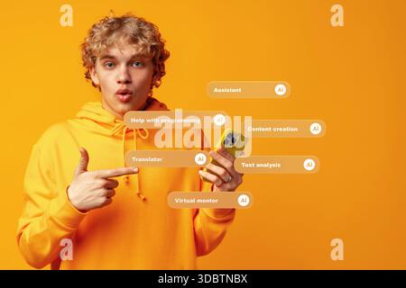 Young person gestures while holding a phone with AI-related tools displayed on screen Stock Photo