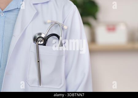 Doctor with Stethoscope in Pocket, Ready for Consultation Stock Photo