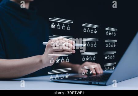 Online test exam and survey form. A person filling out an online exam or survey form, showcasing a hand using a digital pen to select answers on virtu Stock Photo