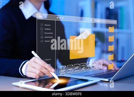 DMS, Document Management System Concept. Businesswoman interacts with digital document management interface on tablet, file organization, cloud storag Stock Photo