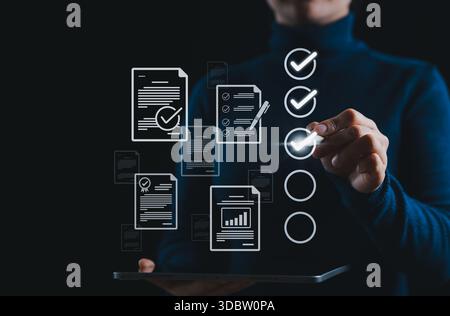 Business Process Checklist Concept. A person interacts with checklists and digital documents, task management, data review, quality assurance, certifi Stock Photo