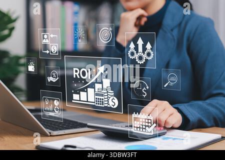 Analyzing ROI and Business Strategy Concepts. Businesswoman working on laptop with icons representing ROI, financial strategies, return on investment, Stock Photo
