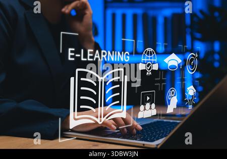 Person using laptop with e-learning interface and education icon. online learning concept, digital education, virtual classroom, knowledge sharing, Stock Photo