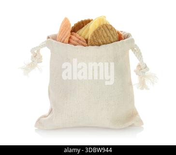 Open cotton fabric bag filled with assorted vegetable chips isolated on a transparent background. Eco friendly zero waste packaging for healthy vegan Stock Photo