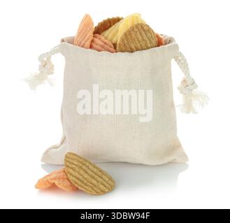 Open cotton fabric bag filled with assorted vegetable chips isolated on a transparent background. Eco friendly zero waste packaging for healthy vegan Stock Photo