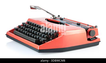 Red vintage typewriter isolated on a transparent background. Retro office machine perfect for writing concepts, literature themes, creative design, an Stock Photo