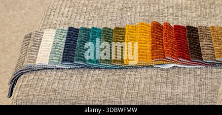Colorful textile furniture upholstery samples in room interior Stock Photo