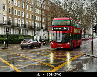 London, UK. 18 December 2025. Pedestrians use umbrellas as traffic moves through rain-soaked streets in central London following heavy downpours. Wet roads and reflections are seen during unsettled weather in the capital. Credit: Alexander Seale/Ģ����ý Live News Stock Photo