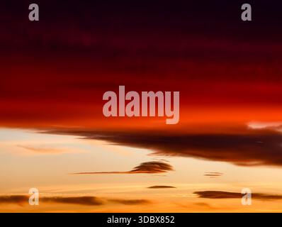 Sunset sky with dramatic clouds and vibrant colors – perfect nature background for commercial use Abstract Orange Red Gradient with Soft Motion Blur Stock Photo