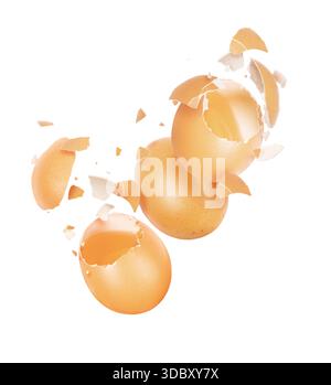 Broken chicken eggs in the air on a white background Stock Photo