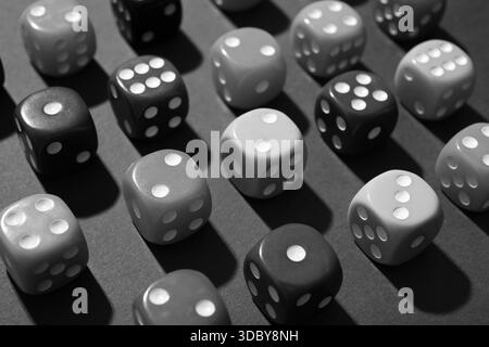 Many game dices on grey background, closeup Stock Photo