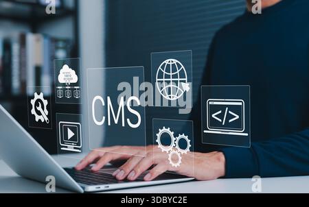 Content management system (CMS) concept. User operating website development tools on laptop, managing web content, cloud data, coding, and multimedia Stock Photo