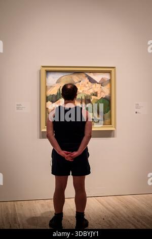 Visitor looking at paintings, Exhibition 'Dangerously Modern ...